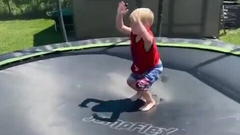 Little boy shows off epic gymnastic moves on the trampoline