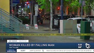 Woman killed by falling man