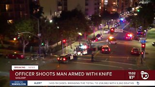 Officer shoots man armed with knife