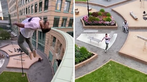 Parkour daredevil performs extreme jump from high building