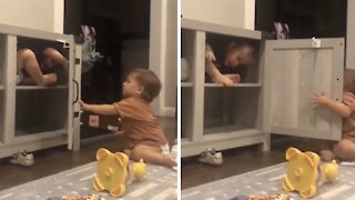 Baby inevitably gets hit in the face by swinging door