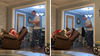 Watchful pup refuses to let dad prank mom