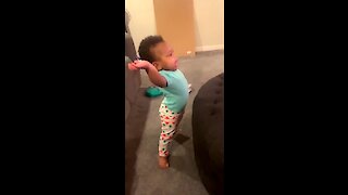 Baby jumps up to dance to favorite tune