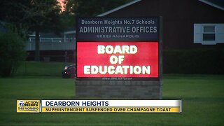 Superintendent suspended over champagne toast