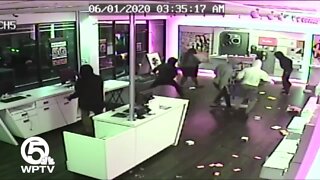 Surveillance video shows looters ransack T-Mobile store