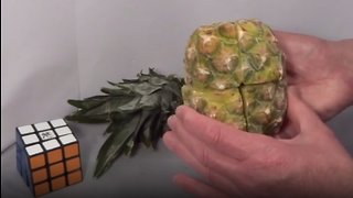 Man creates Rubik's cube out of pineapple, then solves & eats it
