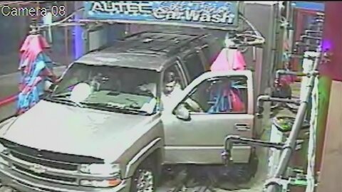 Man Opens Car Door While In Automatic Car Wash To Fix Wipers, But Brush Returns And Slams Door In Opposite Direction