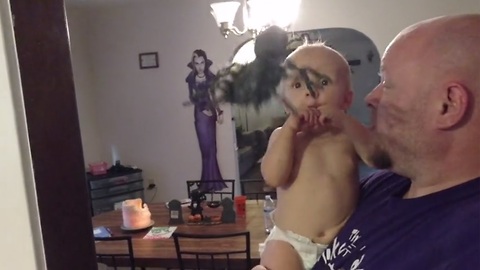 Baby spooked by Halloween spider