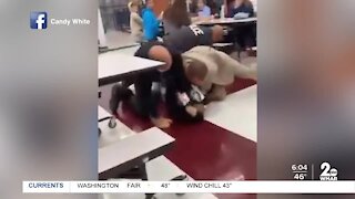 Video shows student being restrained, punched
