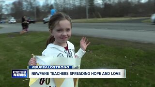 Newfane teachers spread hope and love through car parade