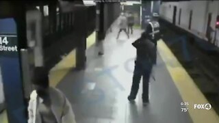 Man pushes woman into train