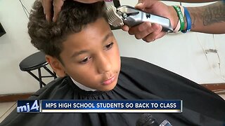 Local barbershop provides free haircuts for children before their first day of school