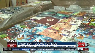 Help sort and box books for thousands of local children in low-income communities
