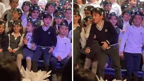 Kid goes off during school concert, busts out dance moves