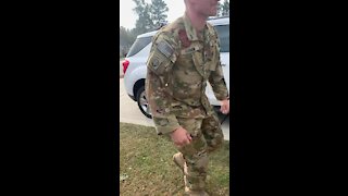 Man returns home from deployment to his family.mp4