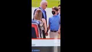 Odd Moment Biden Holds Hands With Gov's Young Son & Gives Him His Used Mask