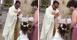 Little Girl Makes Priest Laugh During Blessing