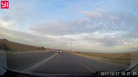 Dash cam captures near head-on collision with overtaker