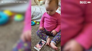 Baby gets emotional after seeing video of herself with dad