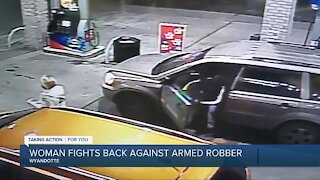 Woman fights back against armed robber