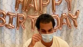 Guy demonstrates how to celebrate birthday under quarantine