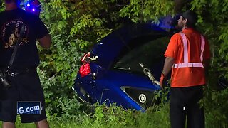 Car drives into East River in Green Bay