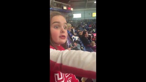 Canadian girl witnesses hockey fight for the first time