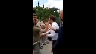 French President Slapped in the Face When Speaking to Crowd
