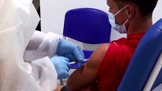 EU looks into Pfizer, Moderna vaccine side effects