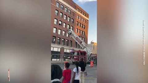 Crowd CHEERS as Woman Rescued from Partially Collapsed Iowa Apartment Building