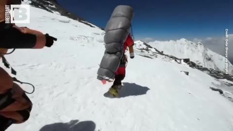 RESCUE: Sherpa Hauls Distressed Climber from Mount Everest's “Death Zone”