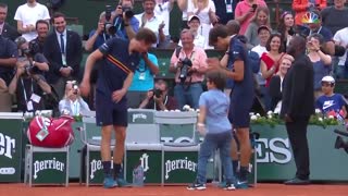Mahut son dancing with him after victory