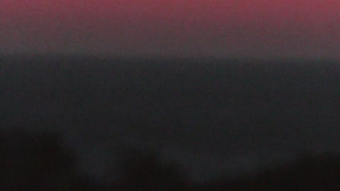 Pink sunset on the black sea. ...