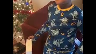Boy Bamboozled by the Packaging