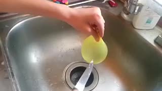 Slow-mo water balloon pop