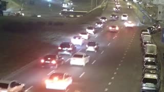 Driver Crashes Into Barrier And Tumbles Off Overpass