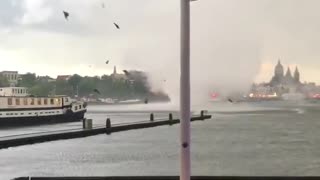 Crazy strong vortex winds startle tourists in Amsterdam