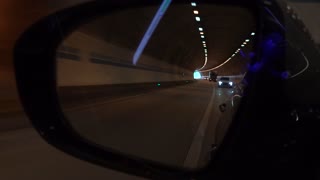 In a car passing through a tunnel 3
