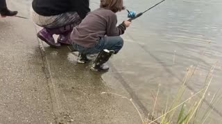 Young Boy Catches A Big Fish In South-central Alaska