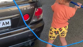 Daughter knows how to wash a car
