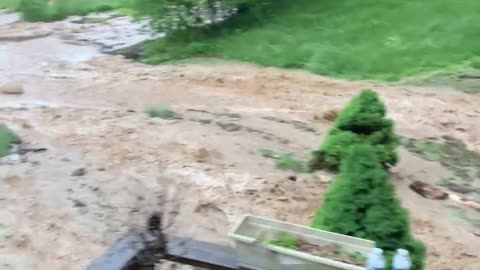 Sudden Flood Forces Family to Flee Home