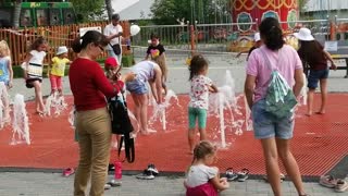 Children play with water.