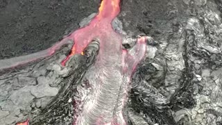 Drone gets up close to erupting volcano crater