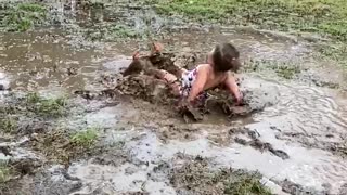 Kiddo Plays in Mud Puddle
