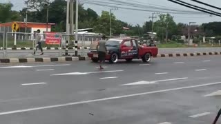 Man Stops Traffic With Odd Poses