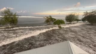 Tsunami wave hitting the island of Tonga