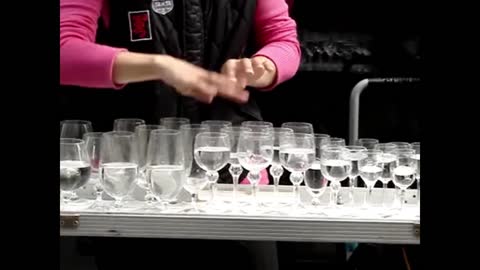 One-of-a-kind glass harp street performance in Germany