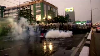 Police clash with anti-government protesters in Bangkok