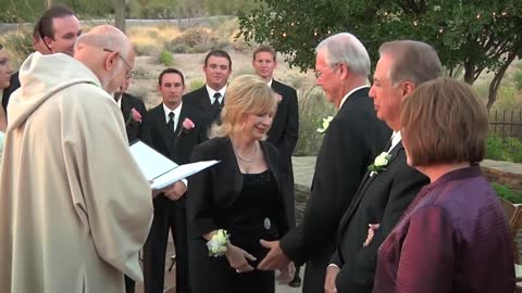 Surprise vow renewal for parents at daughter's wedding