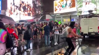 Car Drives Through Times Square Protesters